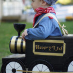 Halloween Costumes 2013- Train, Rosie the Riveter, and a Flower